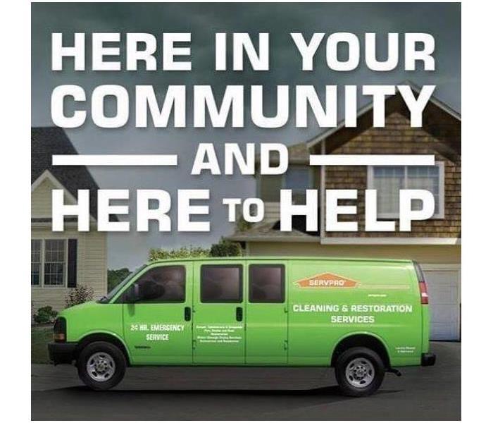Van with logo "Here in your community and here to help"
